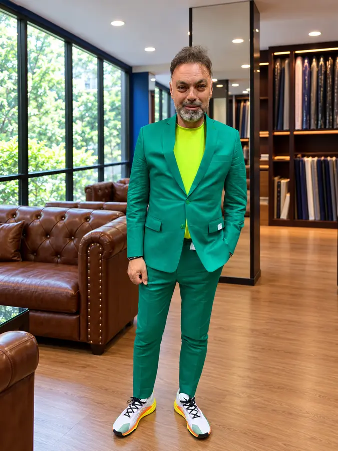 Customer in a bright green tailored suit