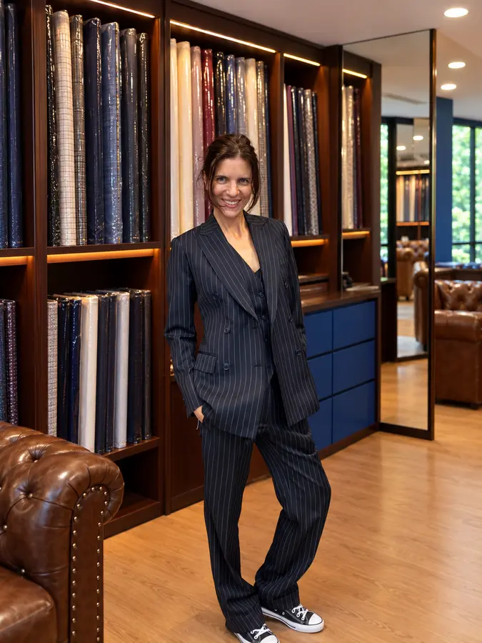 Customer in a navy pinstripe suit