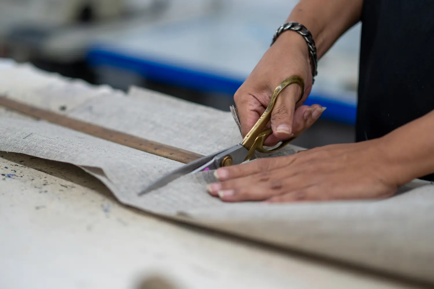 Tailoring shears cutting carefully marked fabric